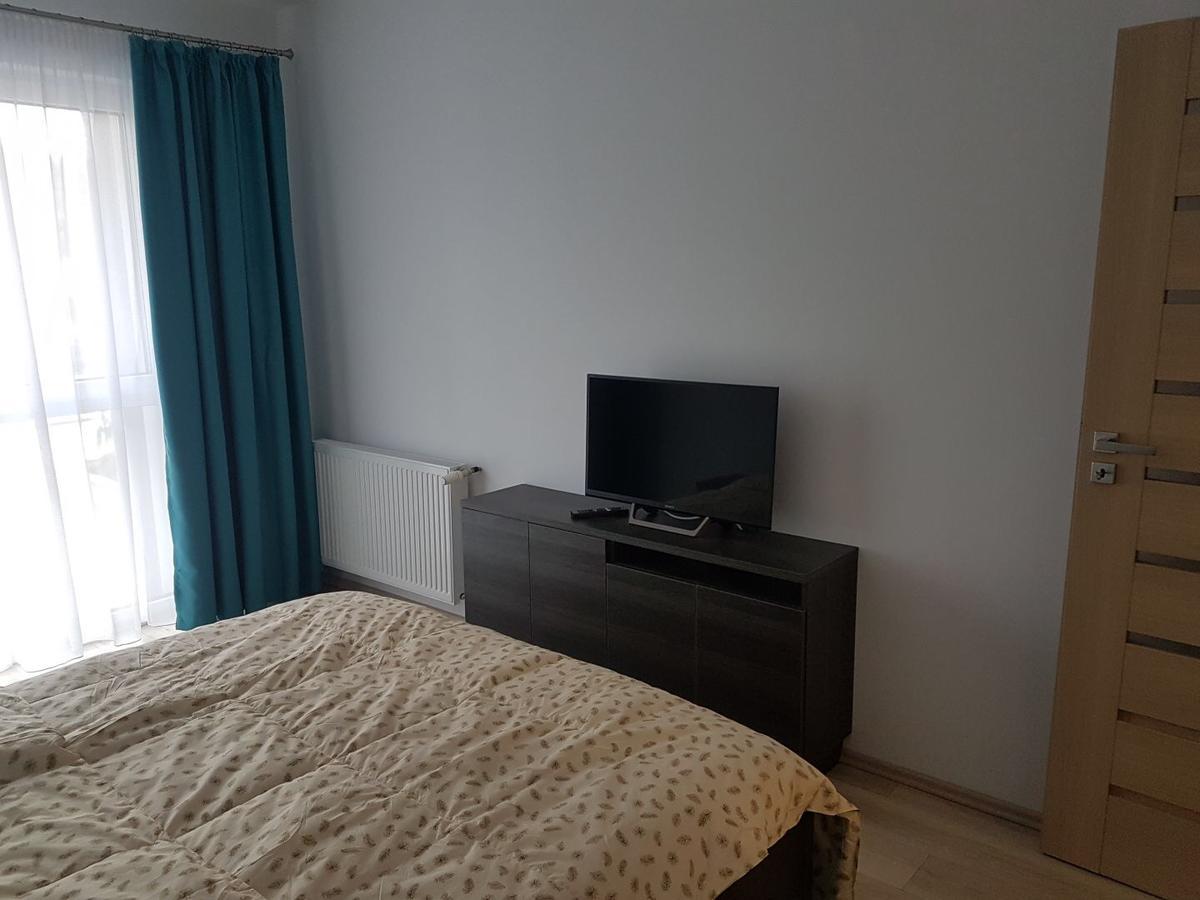 Hotel Platinia クルージュ＝ナポカ エクステリア 写真 A bedroom with a television